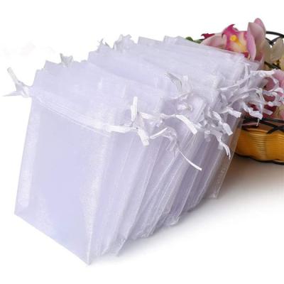 China 100% Eco-friendly Christmas Color Drawstring Pouches Candy Pouch Jewelry Organza Gift Bags for sale