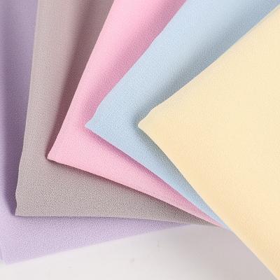 China Shrink-resistant High Density Not Elastic Polyester Fabric 75D Pearl Chiffon Fabric 95gsm for sale