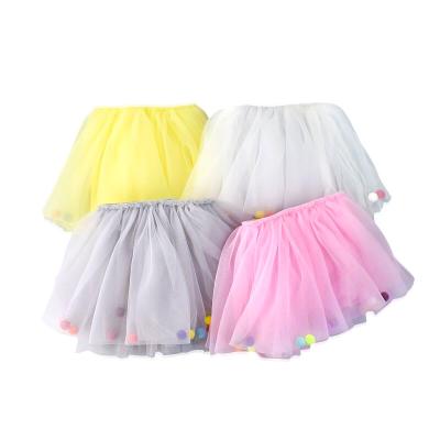 China Popular Children's Day Anti-wrinkle Children's Day Colorful Pom Pom Soft Ball Tulle Girls Tutu Skirts Ruffle Kids Skirt for sale