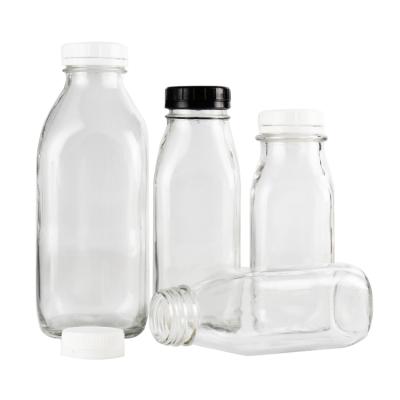 China Wholesale 8oz 12oz 14oz 32oz Square Beverage Milk Bottle Glass Glass Bottle For Milk With Plastic Lid for sale