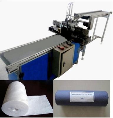 China Absorbent Cotton Roll Cutting and Rolling Machine for sale