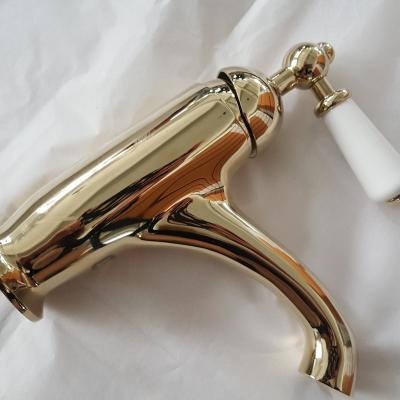 China Basin Gold European Style Artist Metered Single Hole Hot And Cold Brass Faucets Faucet for sale