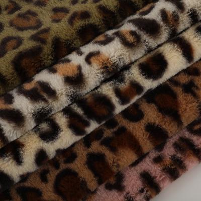 China 100%polyester Fashionable Digital Leopard Print Design No-Fading 100% Polyester Faux Fur Rabbit Plush Fleece Fabric for sale