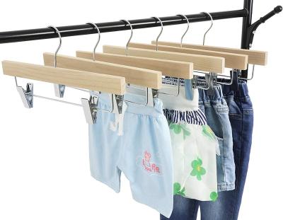 China Luxury Natural Wood Trouser Clips Hangers for Kids Baby Toddler Kids Clothes Hangers with Extra Thick Chrome Clips for sale