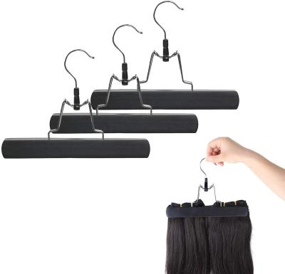 China Amazon Modern Best Selling Wooden Hair Extension Hanger Black Wig Pants Trousers Skirt Hanger for sale