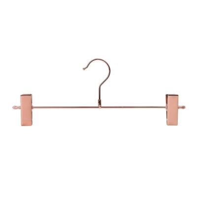 China MOVABLE Rose Copper Gold Shiny Metal PantsTrousers Heavy Duty Hangers, Pants Hangers with Adjustable Two Non Slip Staples Hanger for sale