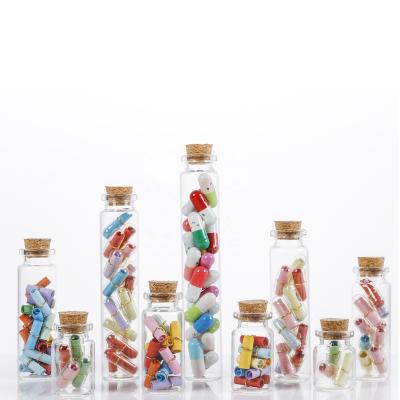 China Mini Vials 10ml Eco-friendly Recyclable Clear Glass Bottles With Cork Stoppers Flat Bottom Test Tubes For Candy Food Storage for sale