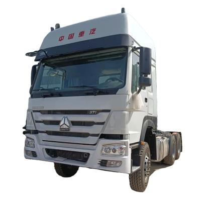 China Good quality used Howo trucks refurbished Sinotruk tractor head price à venda