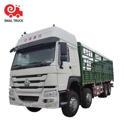 China Manual Used Fence Stake Cargo Truck Sinotruk Howo 8x4 Truck For Animal Delivery for sale