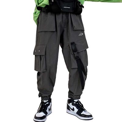 China Anti-Wrinkle Customized Paratrooper Pants Cargo Japanese Style Pants For Men Plus Size Loose Hip Hop Pants for sale