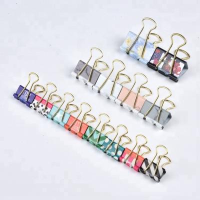 China Lovely Design Office Supplies 8Pcs Printing Style Metal Keeps Stack Tied Cute Decorative Binder Cuts Paper Clamp for sale