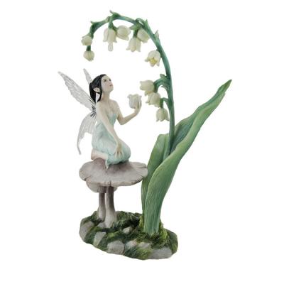 China Europe Polyresin / Resin Wings Resin Fairy Statues Lily Of The Valley Flower Fairy Statue for sale