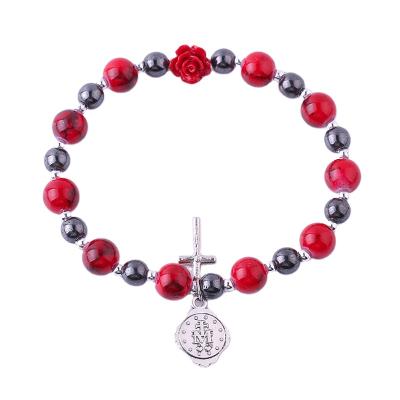 China Religious Religious Red Catholic Rosary 8mm Beads Women Bracelet With Crucifix Pendant On Elastic for sale