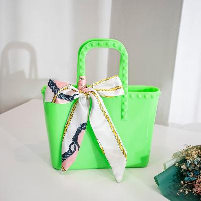 China Fashion 2021 Wholesale Cute Jelly Kid Purses PVC Beach Candy And Handbags Mini Women Tote Colors Bow Bag for sale