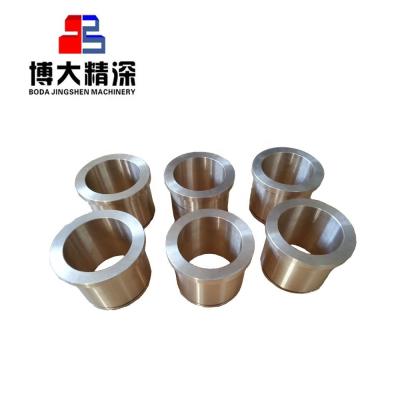 China Excellent HP100 Brass Casting Parts Mining Machinery Cone Crusher Spare Inner Main Frame Bronze Bushing for sale