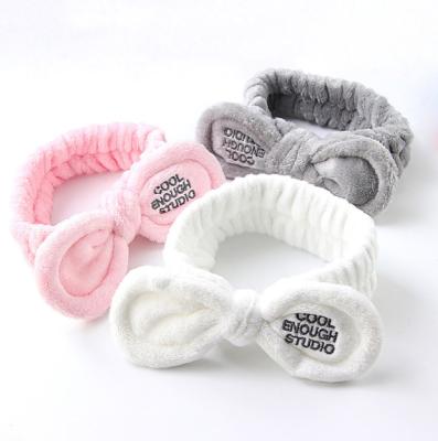 China Wholesale European and American style lettered hair bands for makeup cute facial headband women rabbit skin care spa soft headbands for sale