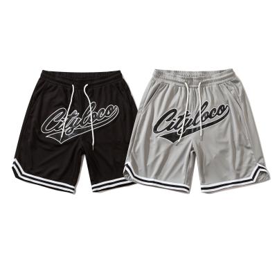 China QUICK DRY Custom Made Gym Mesh Polyester Shorts Custom Men's Basketball Shorts With Pockets for sale