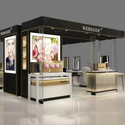 China MDF Mall Display Kiosk For Cosmetic And Cosmetic Display Showcase With Hand Eyebrow for sale