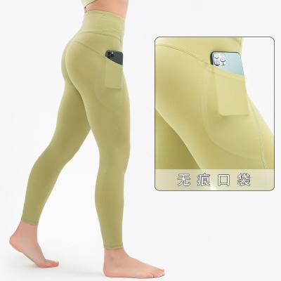 China Ladies Wholesale 2022 Sports Wear Yoga Pants High Waist Hip Lift Fishing Pants Naked Yoga Clothes Sports Pants Women Activewear for sale