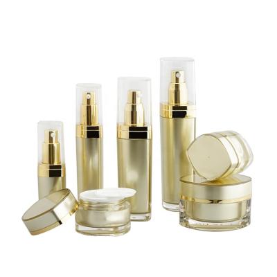 China Custom Recycable Gold Cosmetic Acrylic Skin Care Set With Cream Lotion Jar And Bottle 15ml 30ml 50ml 80ml for sale