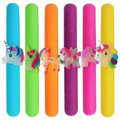 China Kids Glow in the Dark Cartoon Luminous Unicorn Ring Pop Wristband Wristband Silicone Slap Bracelet Ornament for sale