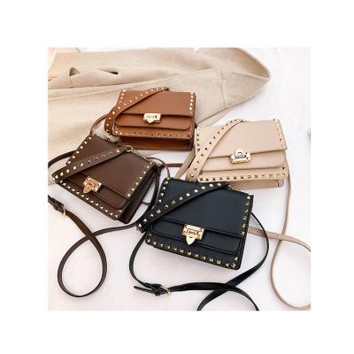 China 2021 New Design Fashion Flap Leisure Handbags Korean Rivet Mujer Pure Color Cross - Body Bolsa Elegant Female Fashionable Simple Shoulder Purses for sale