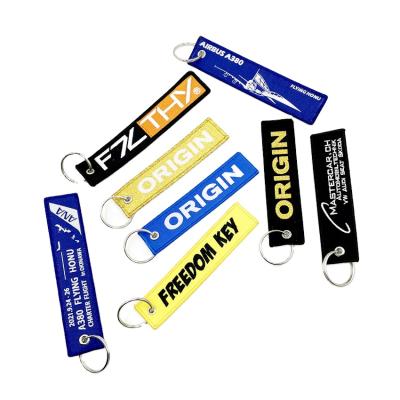 China Custom Woven Key Chains Flying Jet Tag Fabric Embroidery Air Bus Key Chains Heat Sublimation Promotion Gifts for sale