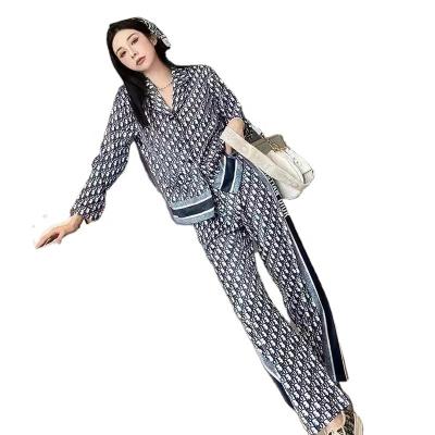 China QUICK DRY Casual Home Use 2 Piece Women Pajamas Suit Satin Silk Pajamas Sets Couple for sale