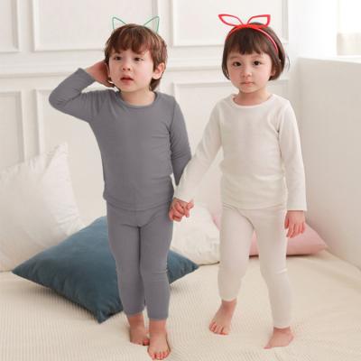 China Pure Color Casual Home Wear Children Two Pieces Baby Clothing Boy Cotton Sets Spring Autumn Girls Pajama Set for sale