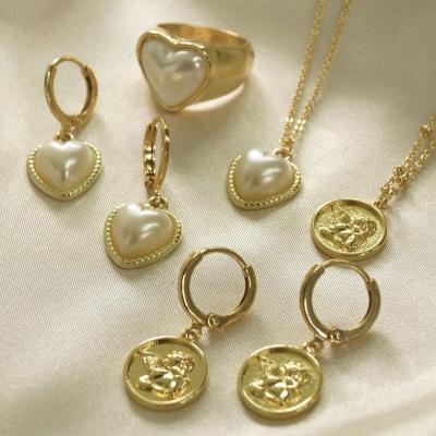 China Environmental Friendly Synthetic Pearlescent Gold Plated Heart Shape Necklace And Earrings Jewelry Set for sale