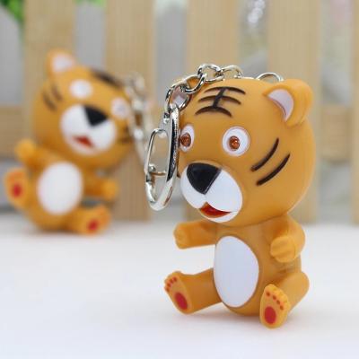 China Accessories Cartoon Tiger Design LED Key Chain Key Chain with Sound, Flashlight Kid Emergency Torch Animal Tiger Key Chain, Car Key Ring for sale