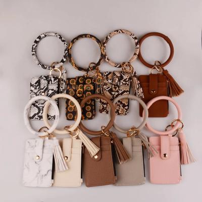 China New Useful Hot Sale R216 Key Chain Bag For Men Women Leopard Wallet PU Tassel Card Bag Snake Bracelet Zipper Key Chain Leather Jewelry for sale