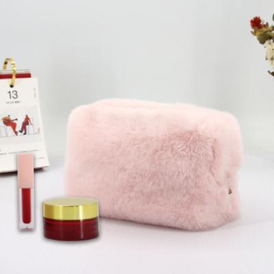 China Custom Plush Faux Fur Pattern Women Pink Bag Fashionable Cute Makeup Fluffy Cosmetic Bag Plush Makeup Bag for sale