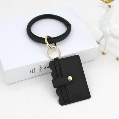 China Small Fashionable Saffiano Large Ring Wrist RFID Sling Credit Card Holder Black Leather Card Holder Wallet for sale