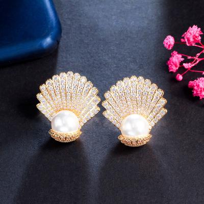 China Sparkling Shiny Micro Paved Zircon Setting Gold Plated Creative Big Scallop Pearl Dangle Stud Earring For Women Unique Jewelry for sale