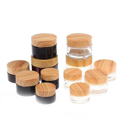 China Luxury Cap Cosmetics Covers Perfume Capsules Jar Wooden Beech Wood Glass Cap for sale