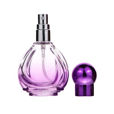 China Spill No 2022 New Design Perfume Bottle 20Ml Colored Perfume Glass Fancy Bottle for sale