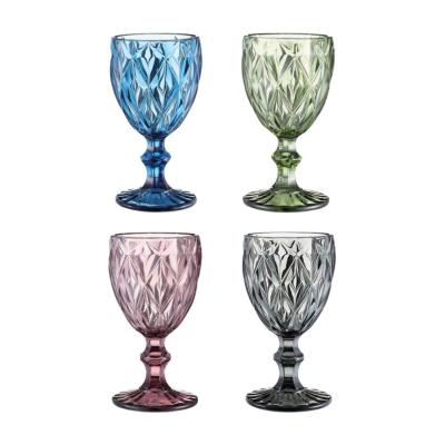 China Lead Free Embosed Soda Lime Glass Black Pink Green Colored Blue Wine Glass Goblet for sale