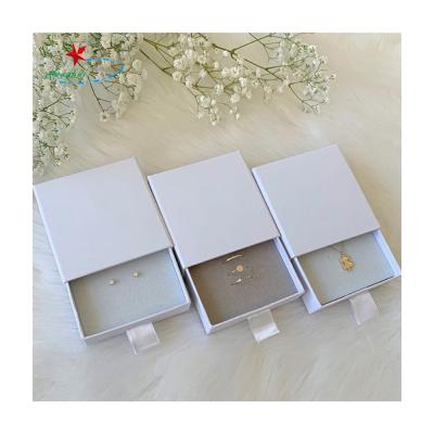 China Recycled Materials Customized Small Flat Pack Jewelry Packaging Gift Box Velvet Jewelry Boxes for sale