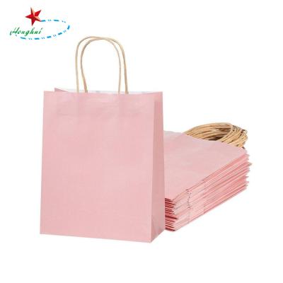 China Recyclable Kraft Paper Bags Wholesale Customize Kraft Paper Packaging Bag Pink Paper Bag With Logo for sale