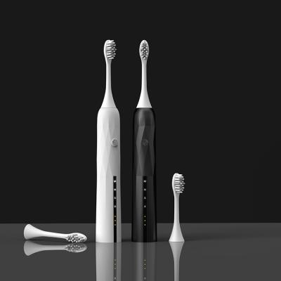 China Women's Aquasonic Gum Battery Operated Ultra Whitening Oral Black Electric Waterproof Toothbrush 4 Gears Dental Care With Facial Cleaning Brush for sale