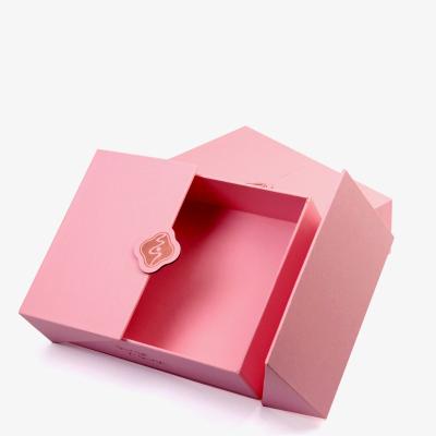 China Unique pink magnetic Gift Box with Custom Design packaging for cosmetics products for sale