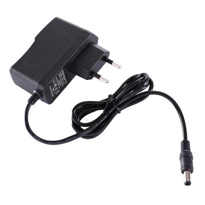 China Long Life and High Reliability High Efficiency Wall Mounted Universal 9v1a Monitoring Power Supply AC to DC Led EVD Power Charger Power Adapter for sale