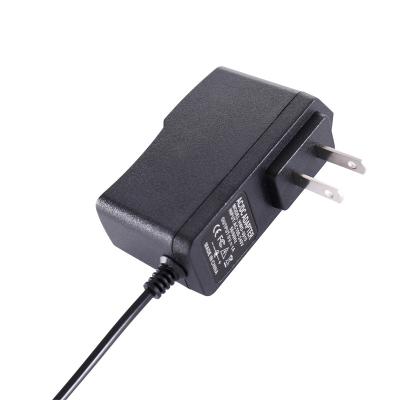 China High Efficiency Long Life and High Reliability 9V 1A Power Adapter 9W Small Appliances Plug High Quality Change Universal AC to DC Power Supply Wall Outlet for Router Camera for sale