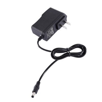 China Wholesale Black Color 10w Low Price Long Life High Reliability 5v2a Power Adapter 50/60hz Output Frequency Router Power Adapter For Home Appliances for sale