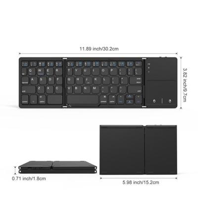 China Wireless Slim Dual Mode Connect Easy To Carry Keyboard With Touchpad Computer Black Mini Foldable BT Wireless Keyboard for sale