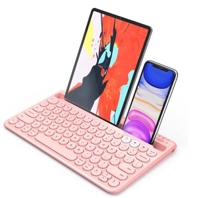 China Wireless Universal Compatibility Dual BT Quick Switch Connect Handheld Keyboard For Phone Multi Tablet Device Wireless Keyboard for sale