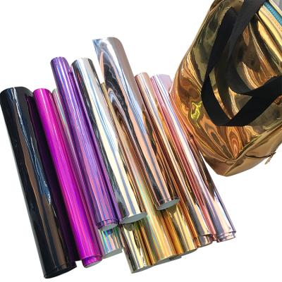 China Vinyl Waterproof Iridescent Photochromic Rainbow Reflective Fabric for sale