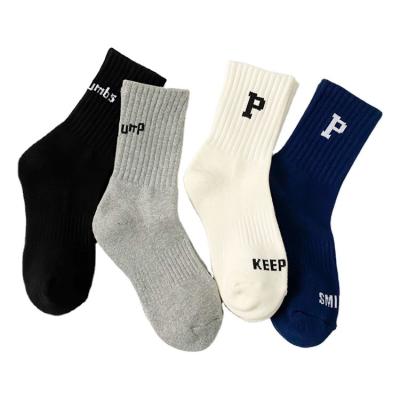 China Autumn and winter mid tube QUICK DRY outdoor trend thickened letter couple terry women socks for sale