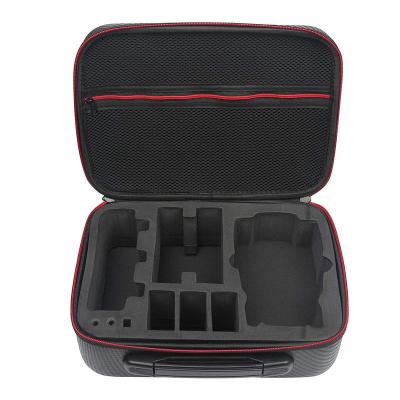 China Shock Proof Embossed Custom Waterproof Eva Packaging Black Oversized Drone Storage Boxes With Mesh Bag Inside for sale